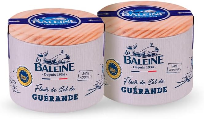 Flor de Sal de Guérande La Baleine - Kit com 2 Unidades Duas embalagens cilíndricas de Flor de Sal de Guérande da marca La Baleine sobre fundo branco