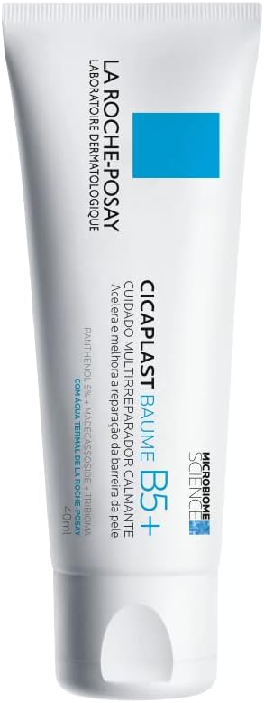 Bálsamo Multirreparador La Roche-Posay Cicaplast Baume B5+ Tubo branco e azul de creme reparador calmante da marca La Roche-Posay em superfície clara e limpa