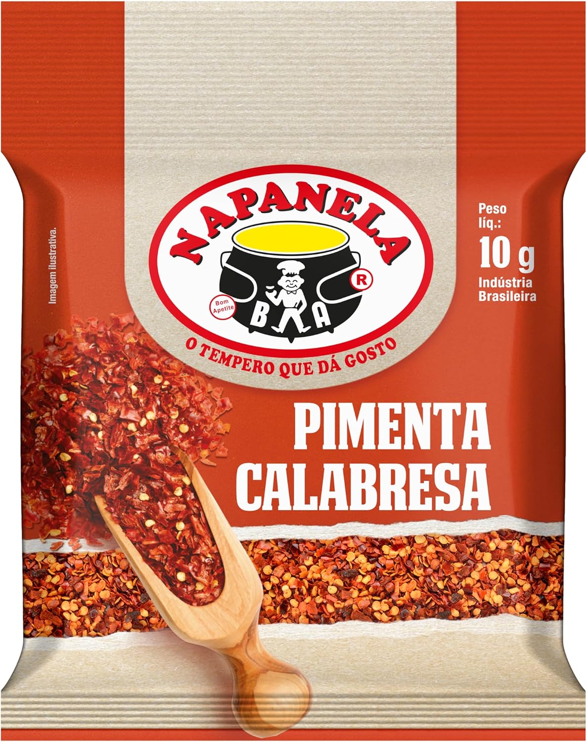 Pimenta Calabresa Napanela Sachê 10g Sachê de pimenta calabresa Napanela de dez gramas posicionado sobre uma superfície de madeira rústica